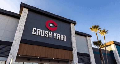 Crush Yard Orlando entrance and sign with palm trees outside